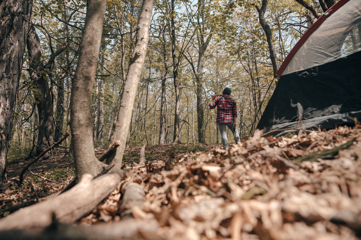Camper beside a tent