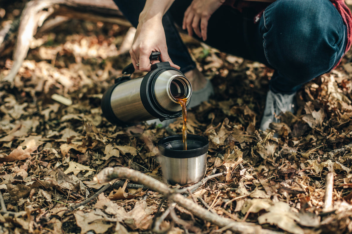 Pouring coffee in the wilderness