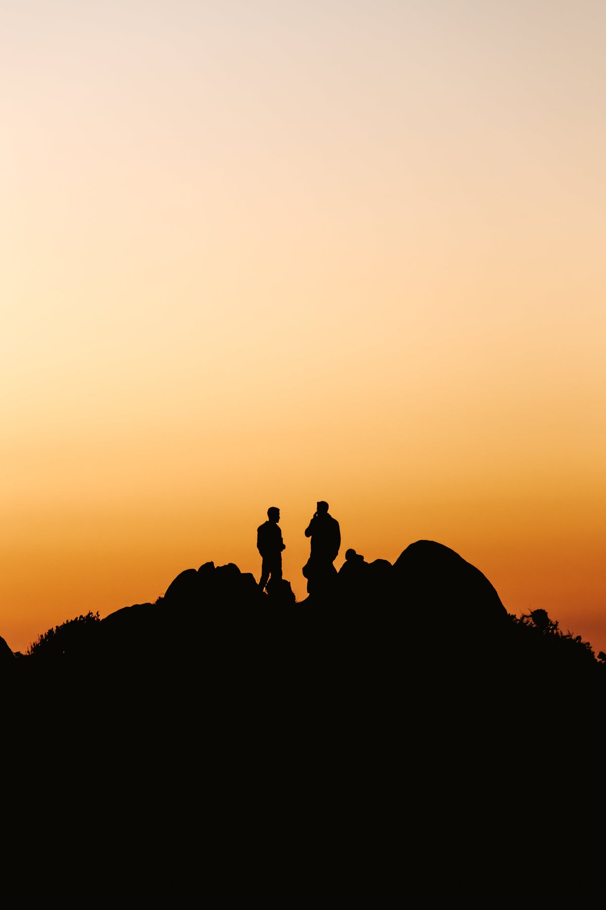 Hikers at sunset
